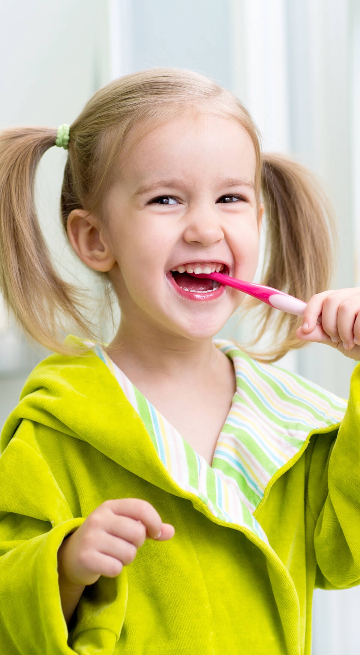 child brushing teeth